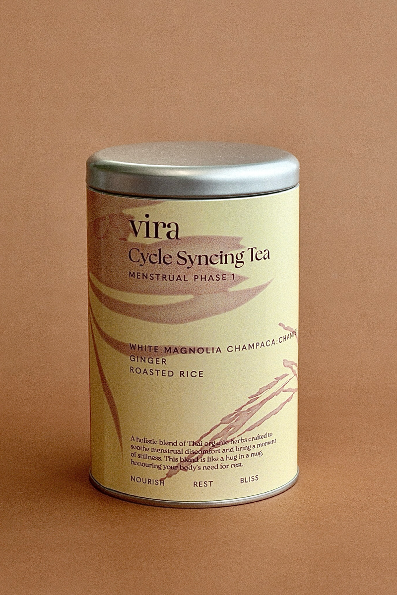 Vira Cycle Syncing Tea canister on a brown background