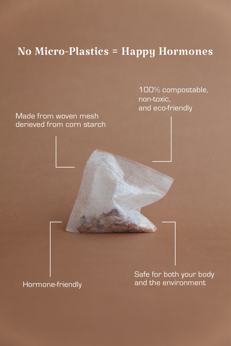 Menstrual Tea bag with compostable and eco-friendly text on a brown background