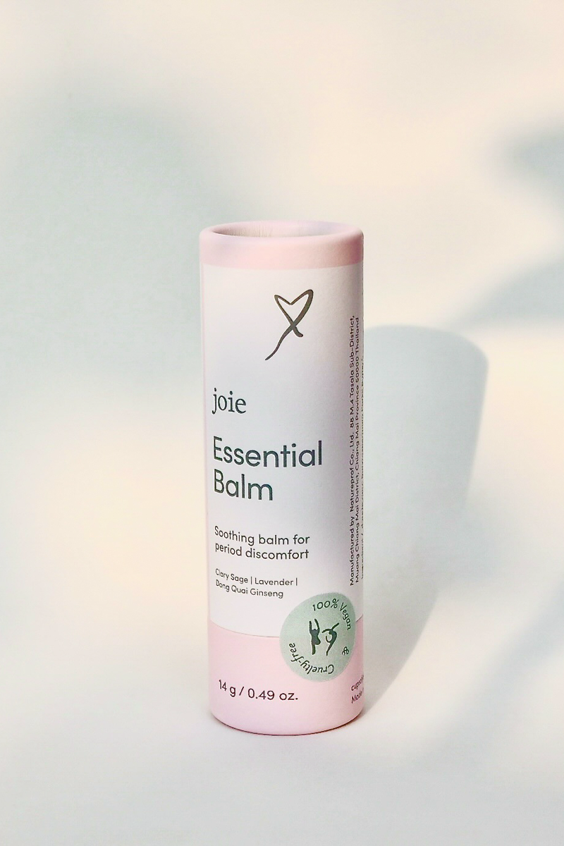 Joie Essential Balm packaging on a light background