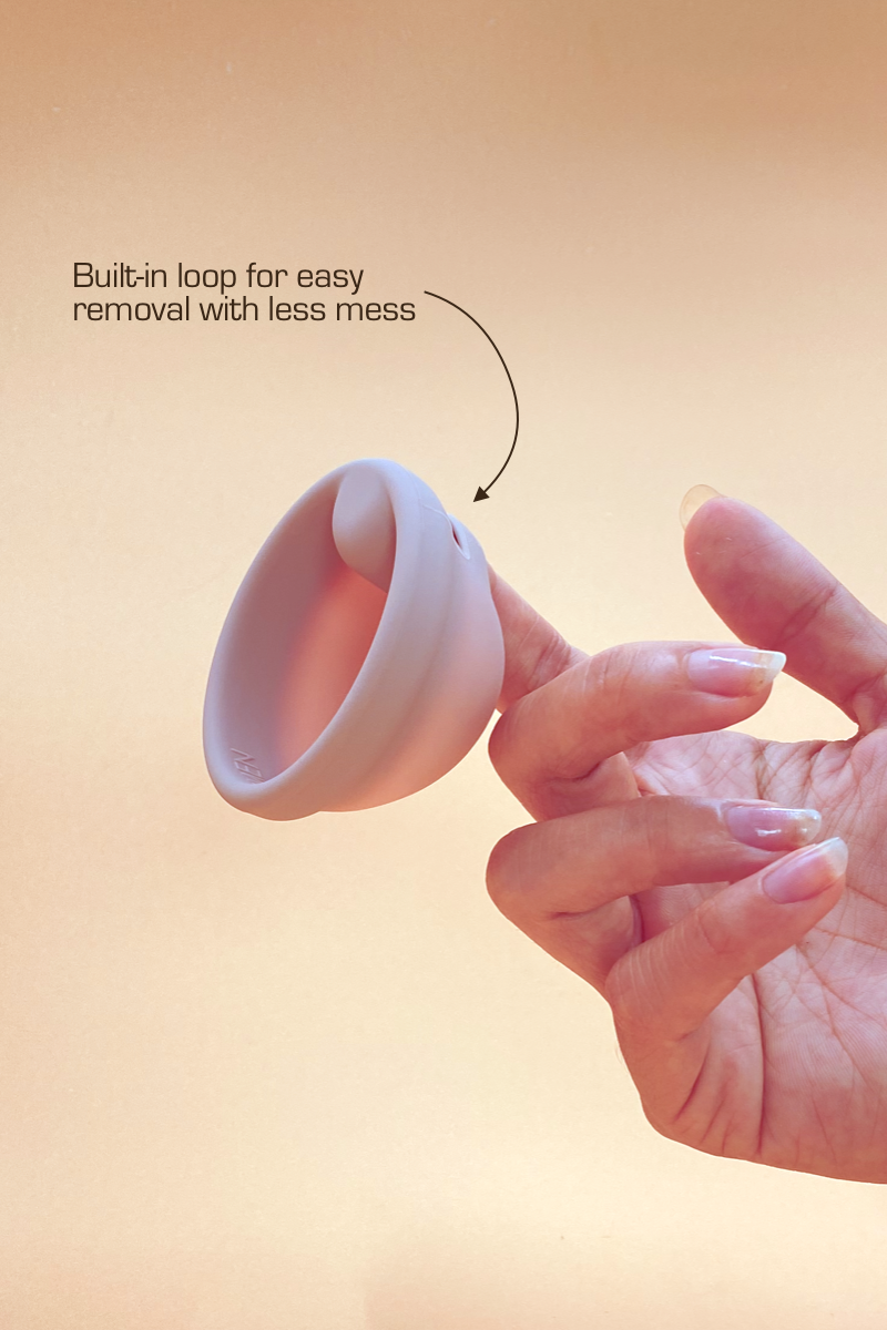Menstrual cup with a built-in loop for easy removal VVOMEN signature disc